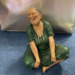 Laughing Elderly Woman Figurine in Green Dress